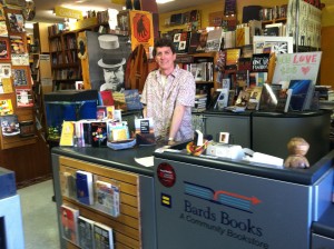 photo of Sven at Bar's Books in Phoenix with counter display of If You See Roadkill, Think Opera