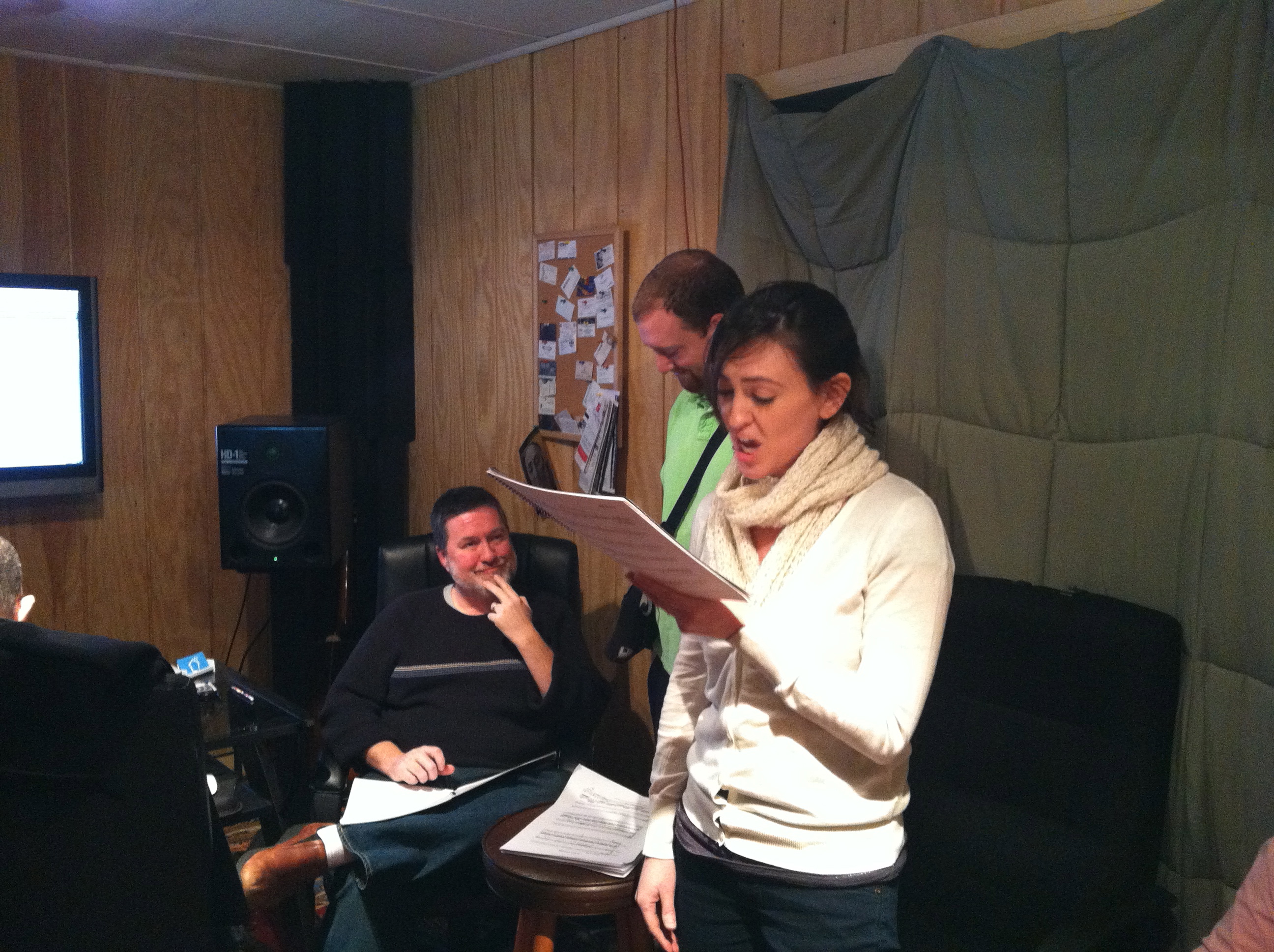 Photo of singers laying down vocal guide or "scratch" tracks