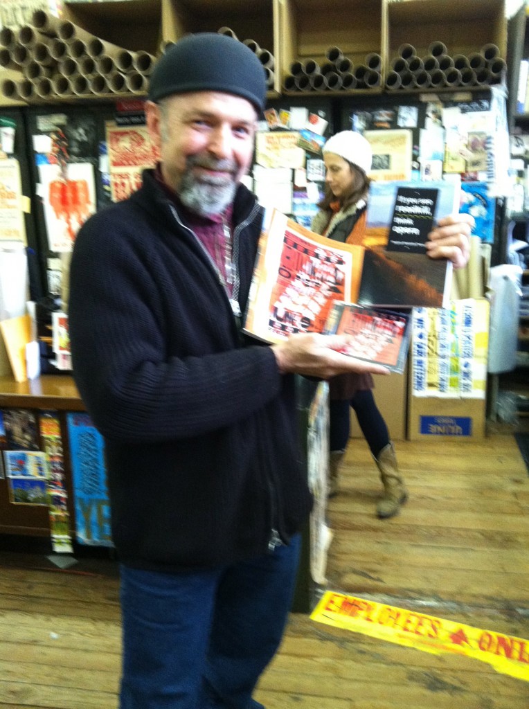 Photo of Hatch Show Print provided the poster for the June 2012 workshop performance. Pictured at Hatch in March 2013 is Jim Sherraden, manager, curator, and chief designer of Hatch Show Print, advising on how to best incorporate the poster design into the covers of the CD and sheet music for A Roadkill Opera.