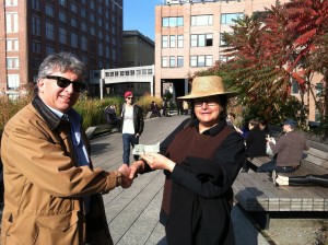 Photo of Stephan Alexander Parker met with his New York business representative, Ryah Naomi, on the High Line in Chelsea, to receive first proceeds from sales of A Roadkill Opera sheet music to Strand Books