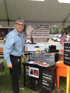 Photo of Stephan Alexander Parker in the tent display for A Roadkill Opera at the May 2013 Gaithersburg Book Festival in Maryland