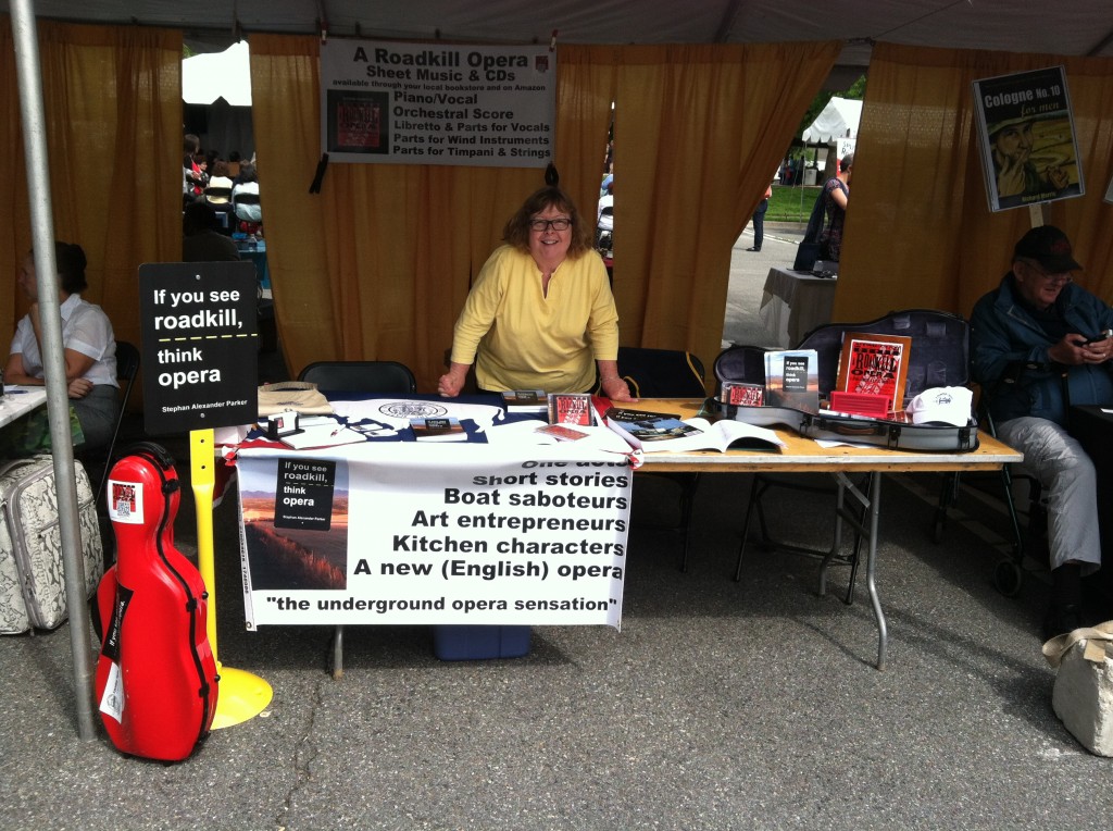 Photo of DJ Choupin hawking If You See Roadkill, Think Opera, at the 2014 Gaithersburg Book Festival.