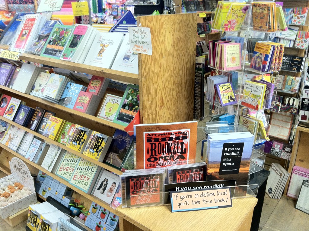 Photo showing If You See Roadkill, Think Opera and A Roadkill Opera are featured prominently in the store's display of local authors.
