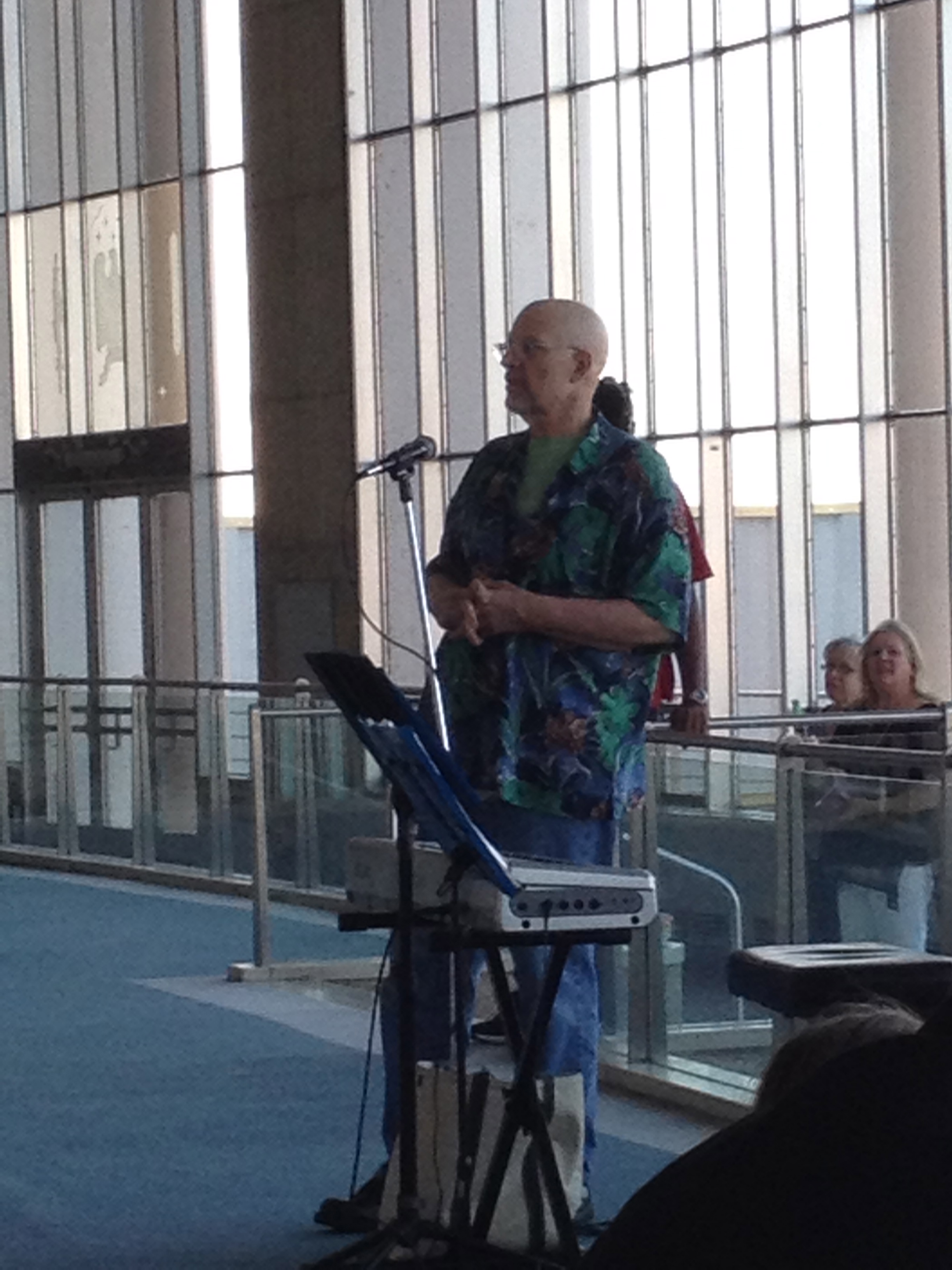 Photo of Artomatic Chair Emeritus and founder George Koch speaking at the opening of Artomatic Takes Flight on July 25, 2014.