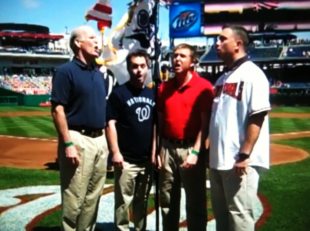 Four members of open5ths sing "The Star-Spangled Banner" before a Washington Nationals-Milwaukee Brewers game on April 17, 2010, at Nationals Park in Washington, D.C. From left to right is Peter Rogers, bass; Ed Hoover, tenor; Jeff Dokken, tenor; and Andy Pulliam, bass.