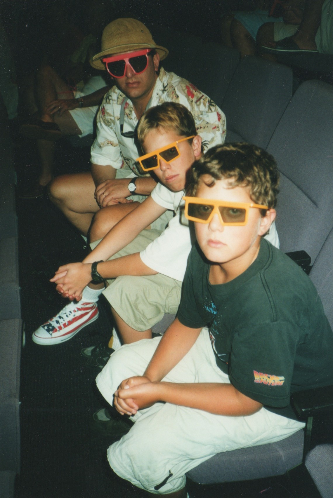 Photo of Jason Ganz, Ben Ganz, and Stephan Alexander Parker wearing 3D glasses