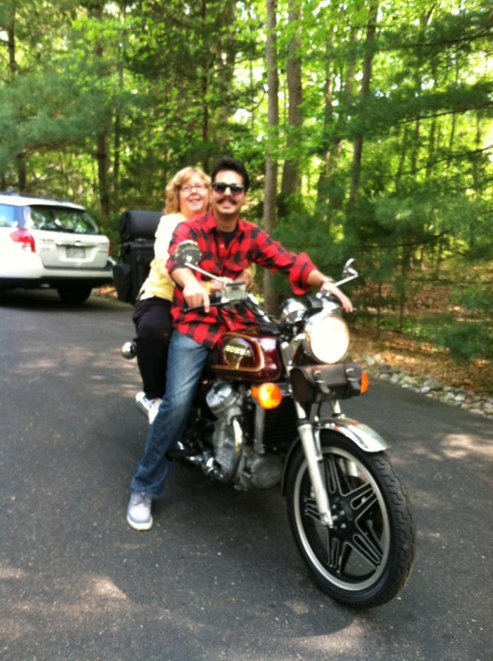 Photo of DJ Choupin and RIch Gaudiosi on a motorcycle