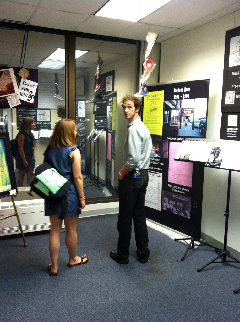 Photo of a woman and a man in the Roadkill Opera exhibit.