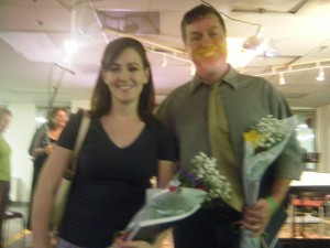 Photo of Wehrmeyer and Timpane holding bouquets