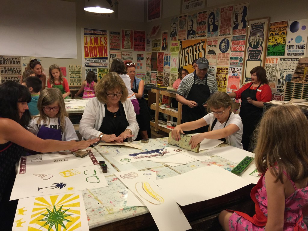 Photo of DJ Choupin at work at Hatch Show Print