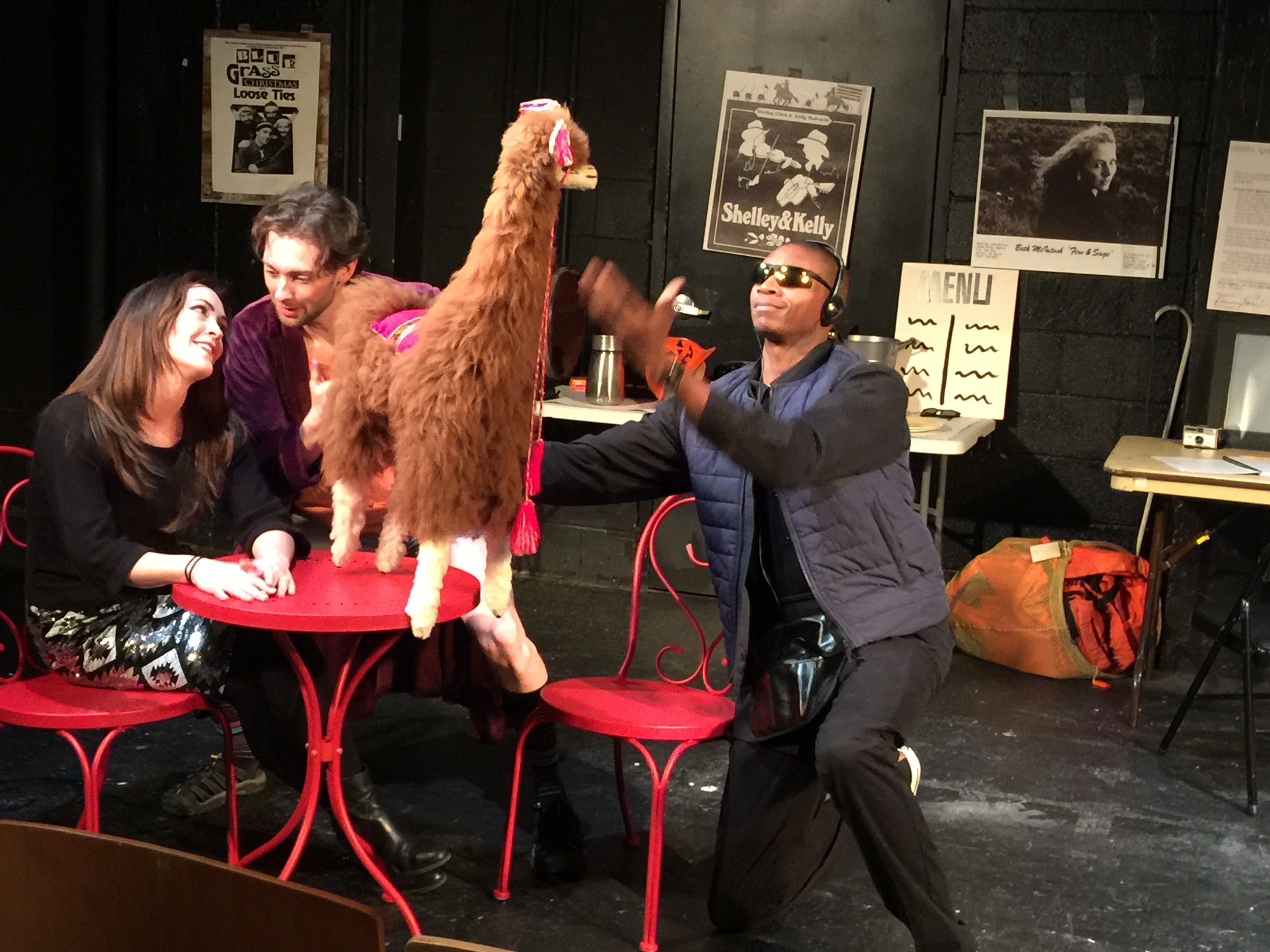 Photo of Holly, Eddie, llama, and Marvin on the set of A Roadkill Opera