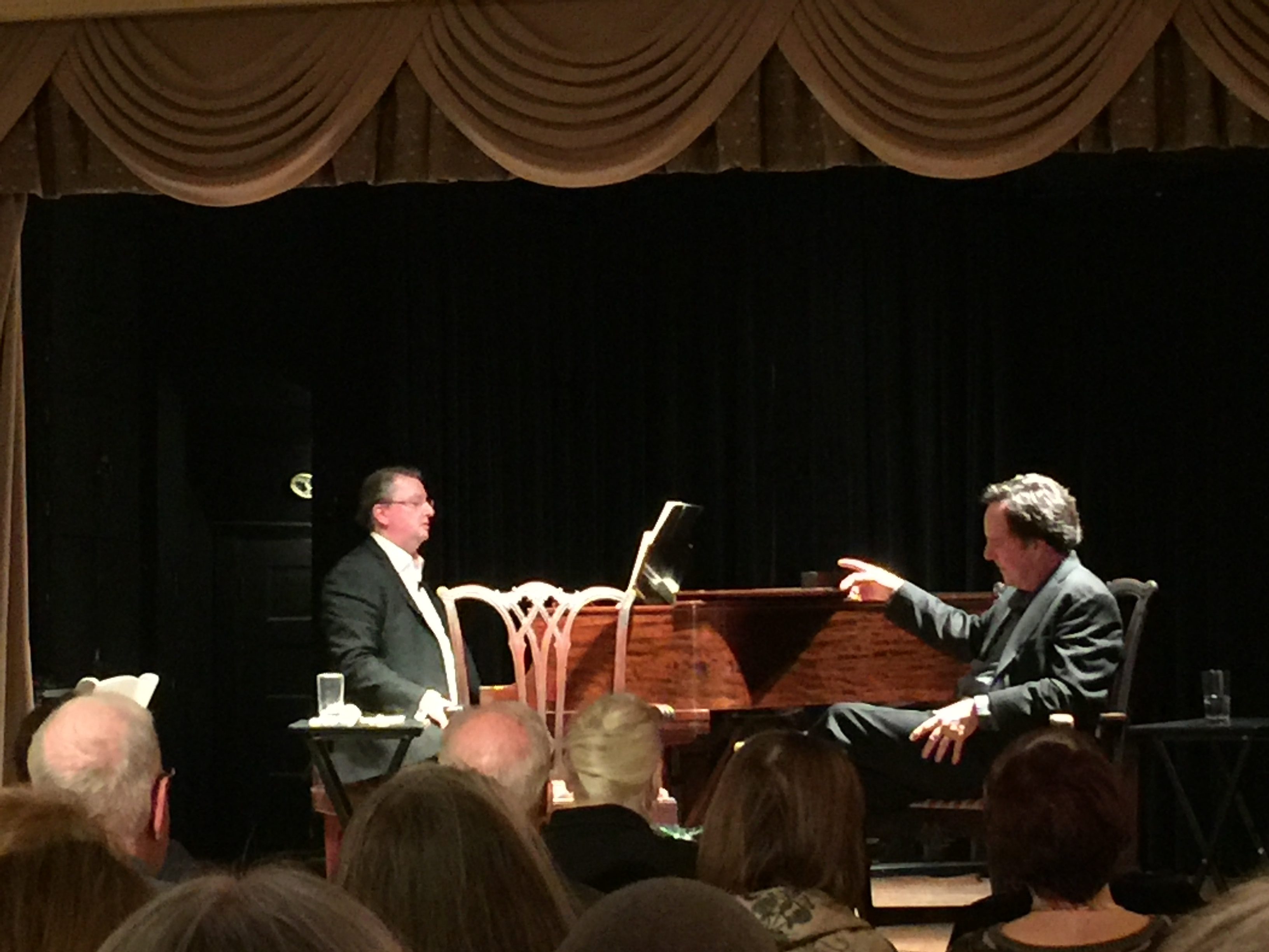 Photo of Walker and Brown speaking at the Arts Club of Washington (DC) in January 2017