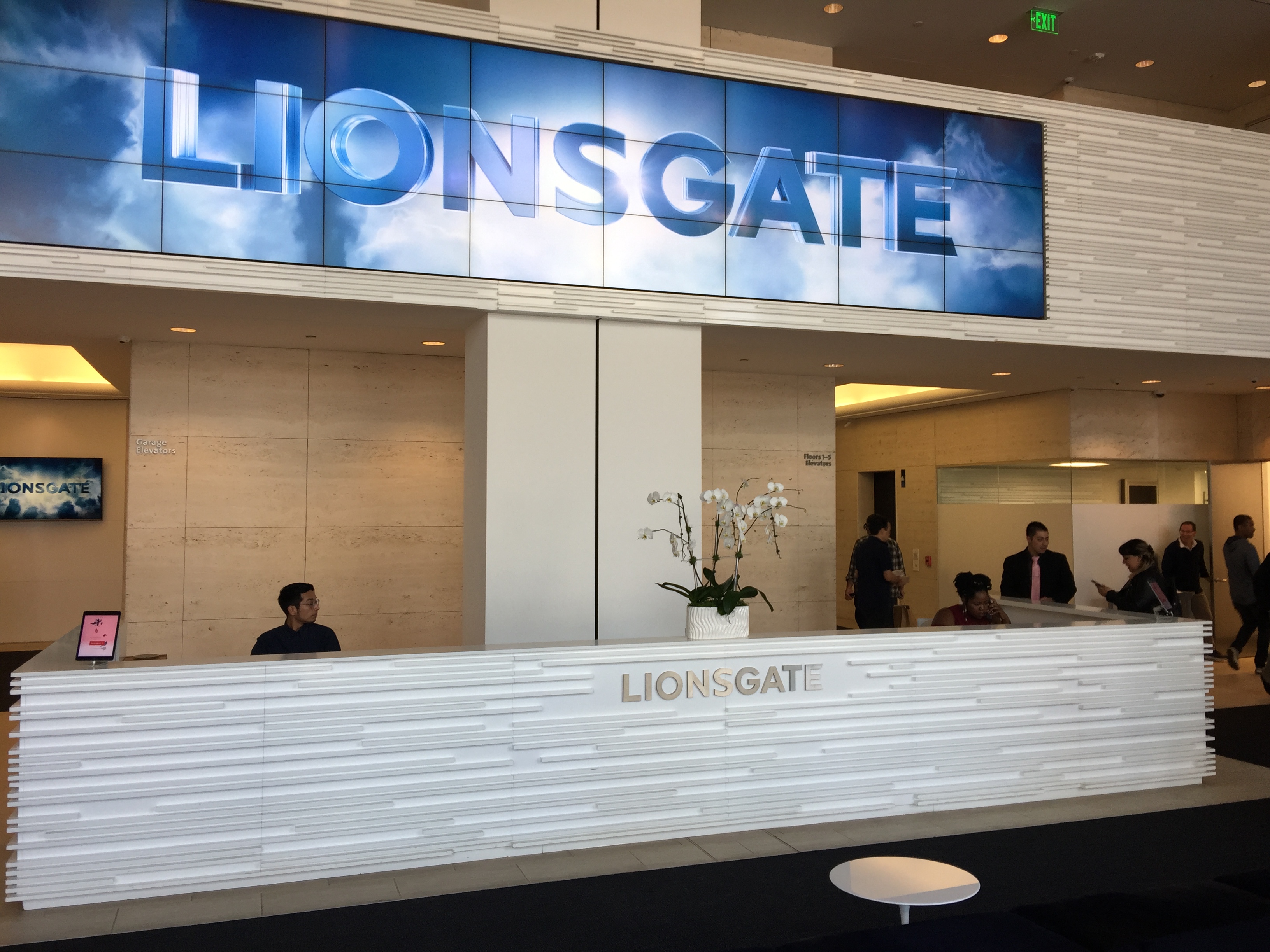 Photo of front desk with greeters at Lionsgate studio