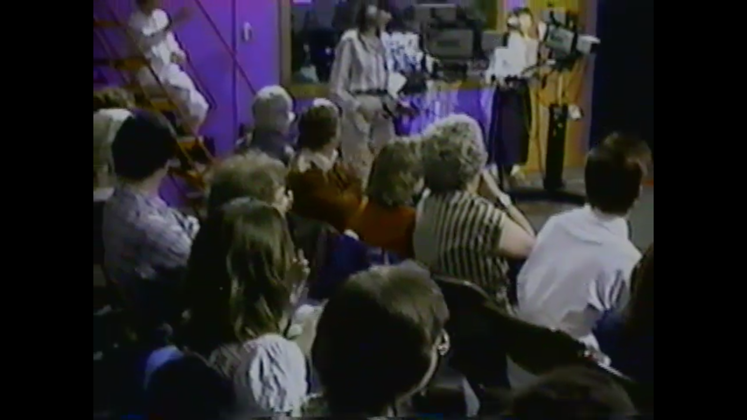 Photo of studio audience for The Friday Club cable tv show in 1980s Evanston, Illinois, with the camera operators.