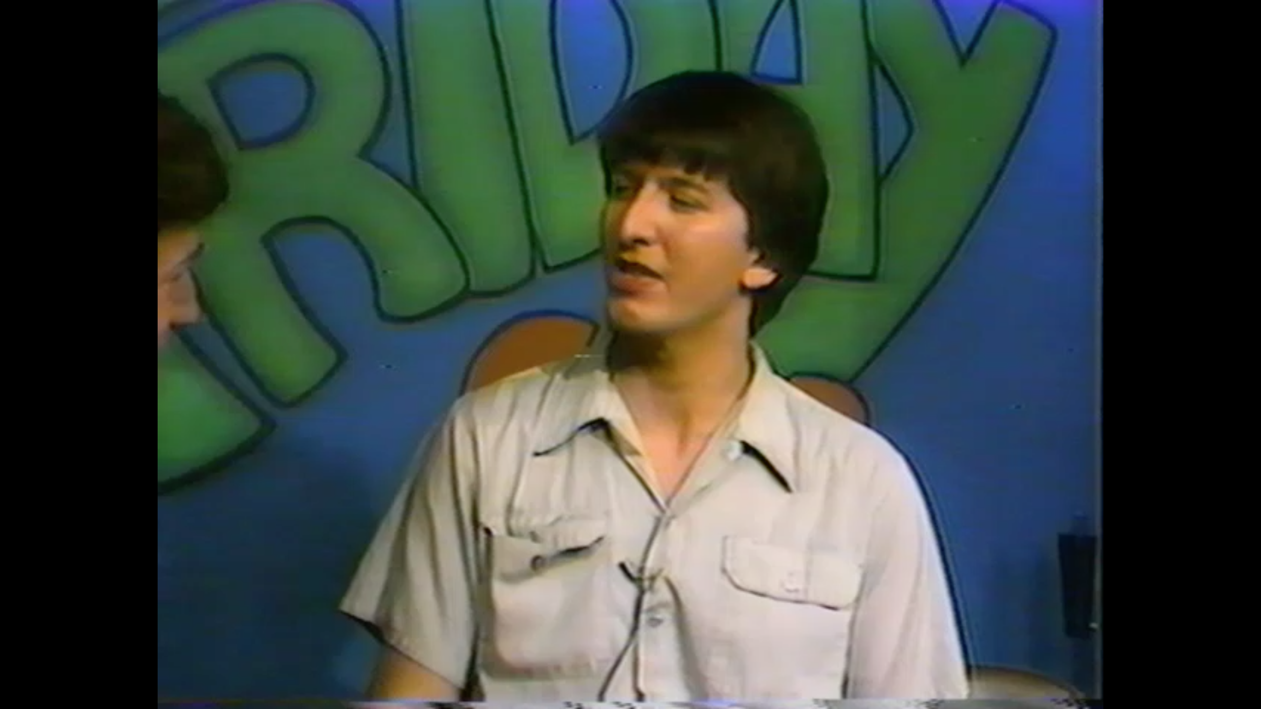 Photo of Comedy Magician Stephan Parker on The Friday Club local cable TV show in Evanston, Illinois, in the 1980s. 
